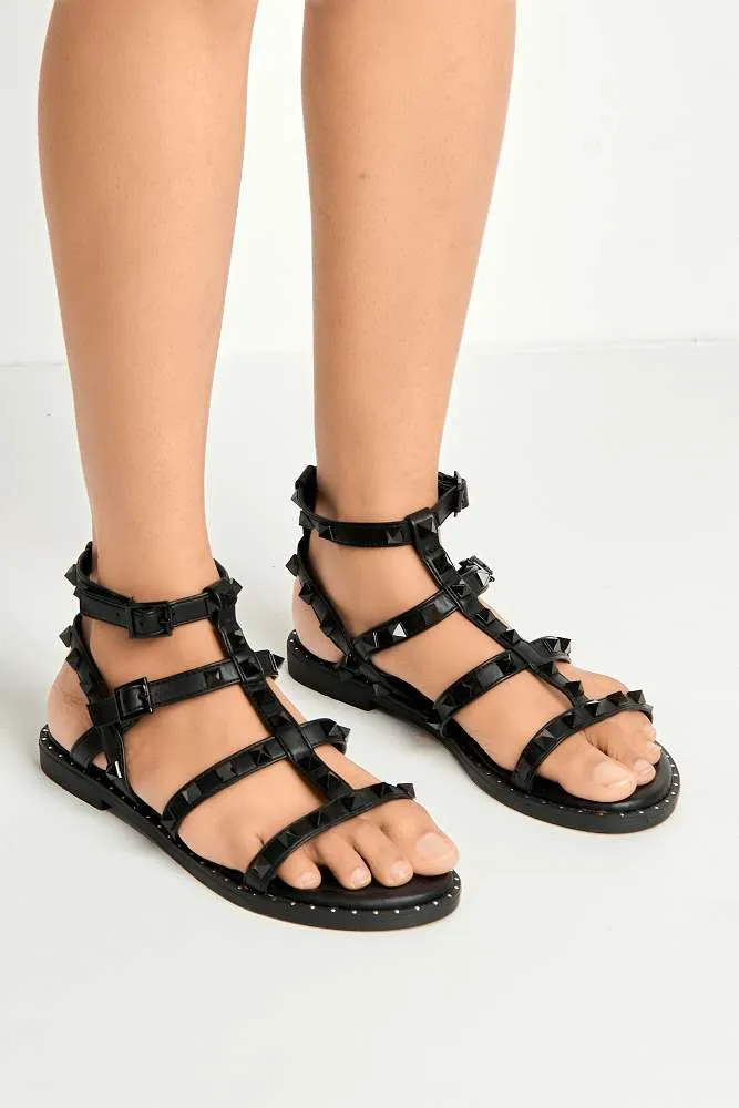 Hira Anklestrap Studded Gladiator Flat Sandals in Black