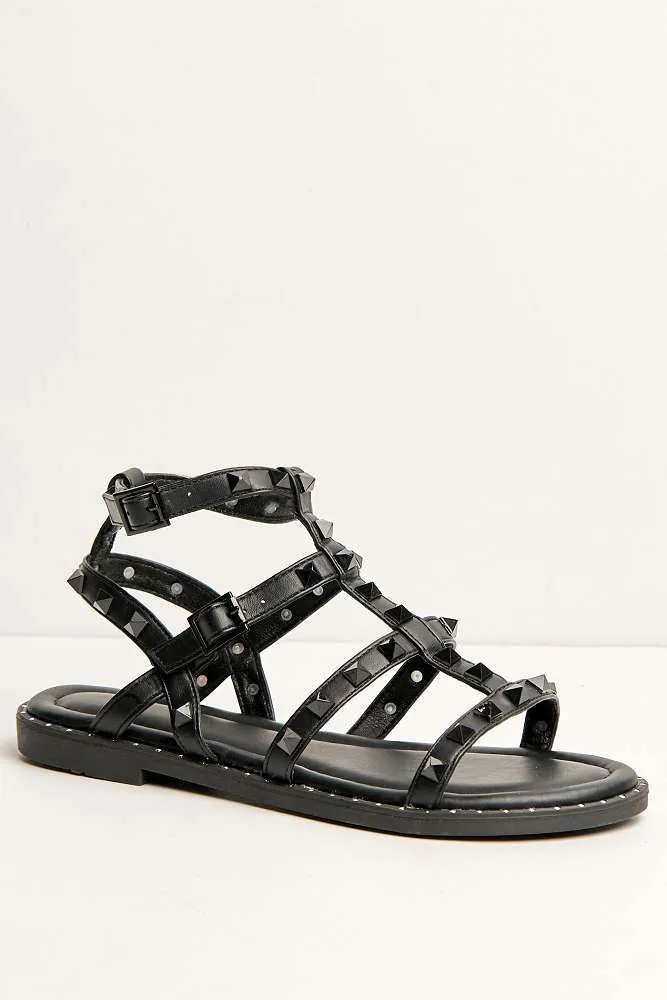 Hira Anklestrap Studded Gladiator Flat Sandals in Black